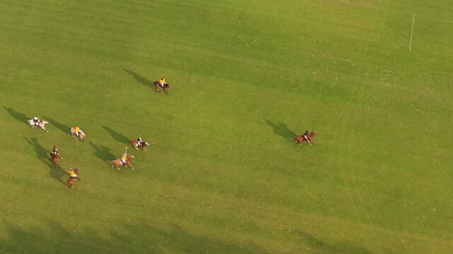Aerial view of polo players competing on horseback during a match