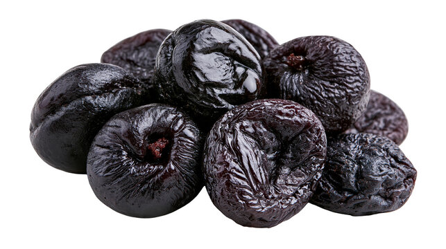 Heap of dark purple dried prunes with wrinkled skin texture