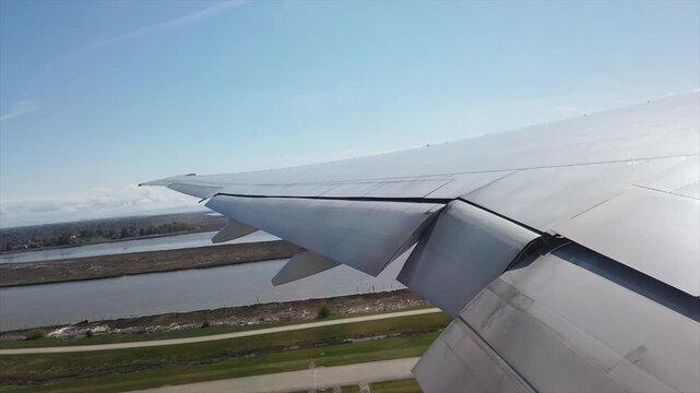 Commercial airplane taking off and flying away into the sky