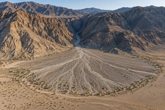 Alluvial fan spreading from a dry mountain canyon