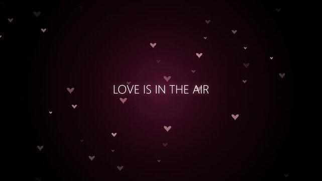 Love is in the air text with floating pink hearts animation