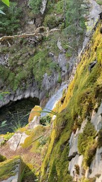 Mossy Rocky Gorge Wall Above Mountain Water Basin