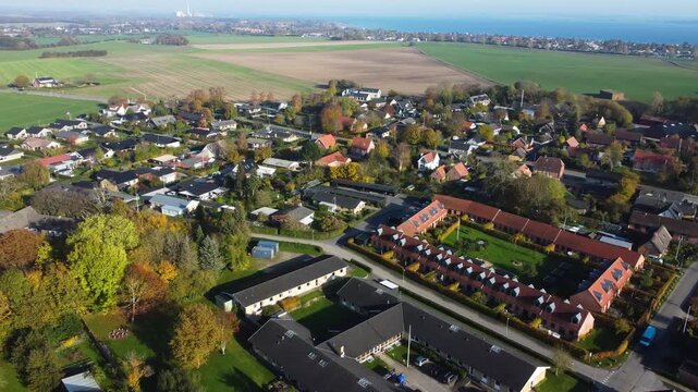 Rows of homes and leafy residential blocks at Gammel Ega near Aarhus, Denmark, aerial