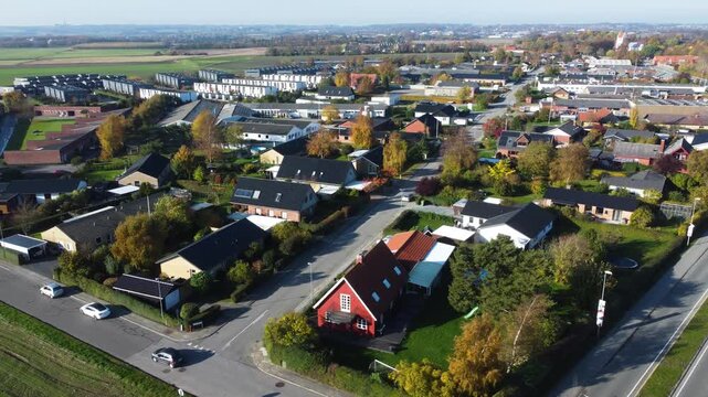 Residential neighborhood and roads across Gammel Ega near Aarhus, Denmark, aerial
