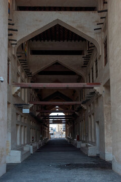 Doha, Qatar - Souq Waqif in Doha, Qatar, showcasing its traditional Qatari architecture, narrow pathways, heritage buildings, shops, and vibrant atmosphere. 