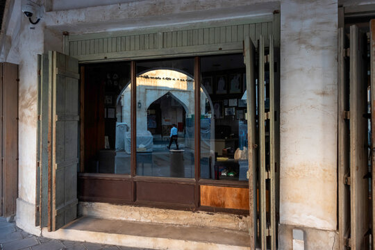 Doha, Qatar - Souq Waqif in Doha, Qatar, showcasing its traditional Qatari architecture, narrow pathways, heritage buildings, shops, and vibrant atmosphere. 