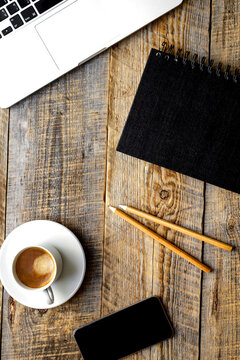 Working place with laptop on wooden table