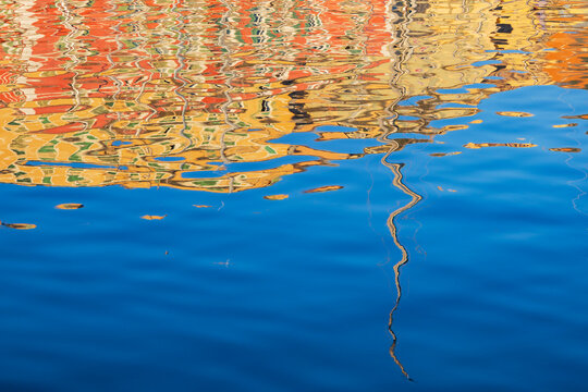 Ripples and colorful Reflections on water in bastia corsica