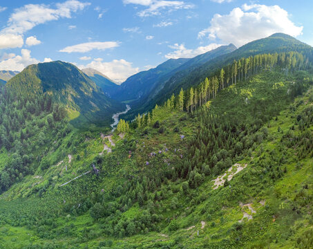 Wilderness and nature conservation, aerial view of the Kitzb&uuml;hel Alps and Hohe Tauern National Park in Austria with mountain forest and alpine valley