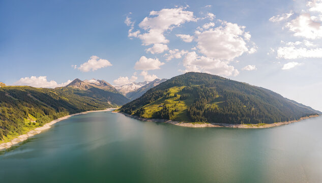 Alpine lake in Kitzb&uuml;hel Alps, pristine mountain landscape and wilderness in Hohe Tauern National Park, scenic aerial view of Austrian Alps in summer