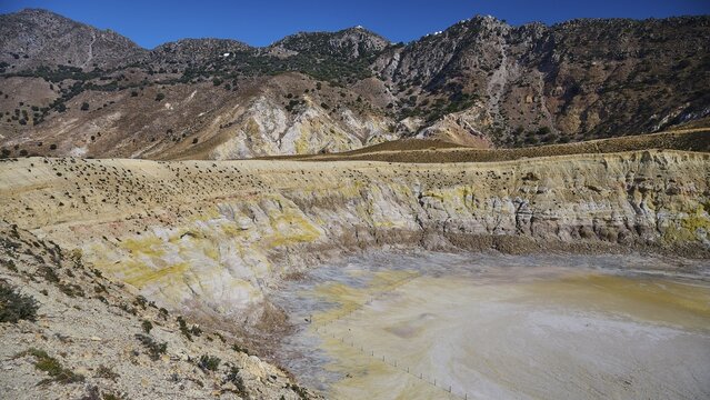 Volcanic crater with geological details in a hilly, dry landscape area, volcanism, volcanic island, Caldera Stefanos, Nisyros, Dodecanese, Greek Islands, Greece