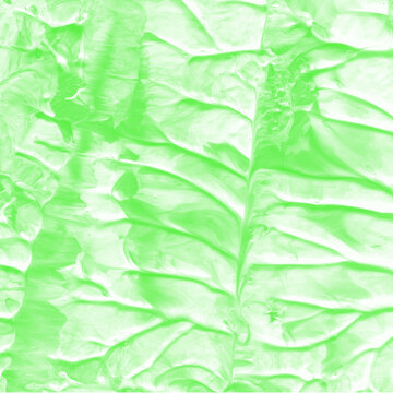 Green painted brush marks and artistic strokes