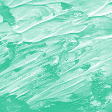 Green painted brush marks and artistic strokes