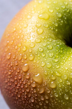 Apple with water drops, close up 