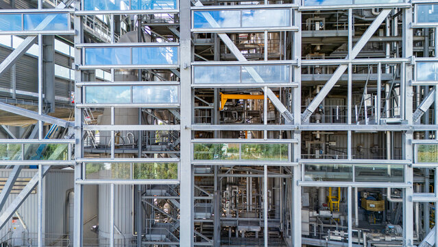 Steel frame and glazing of a building under construction seen from a drone