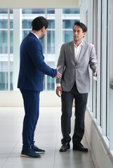 Businessman business handshake office corridor professional partnership © ADD PHOTO