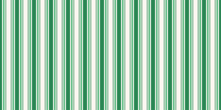 Stripe candy cane seamless pattern with green and white vertical stripes. Design peppermint winter stripe for Christmas background, wrapping paper, festive card