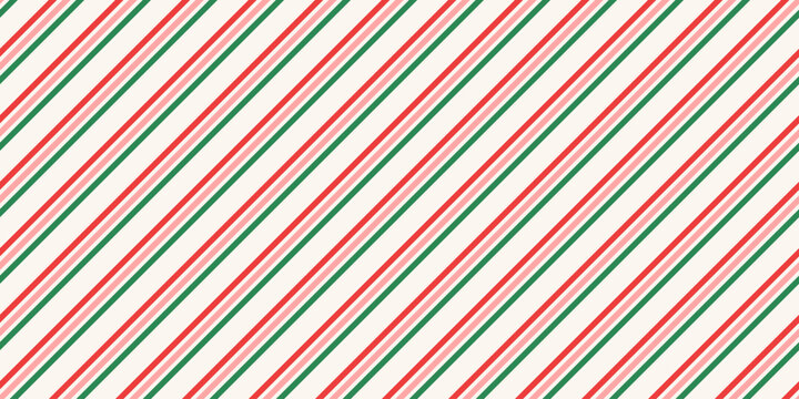 Stripe candy cane seamless pattern with red, green and white diagonal stripes. Design winter stripe for Christmas background, wrapping paper, festive card.