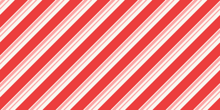 Stripe candy cane seamless pattern with red, pink and white diagonal stripes. Design winter stripe for Christmas background, wrapping paper, festive card