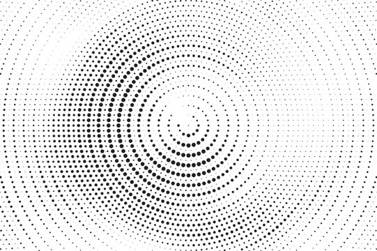 Abstract black and white halftone dots form flowing circular waves, creating a modern optical illusion with depth, motion and clean space for creative graphic design.