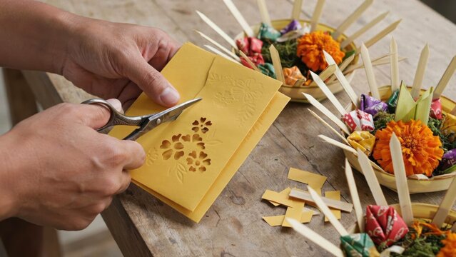Crafting balinese canang sari offerings