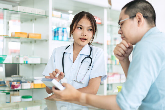 A woman and a man are in a pharmacy
