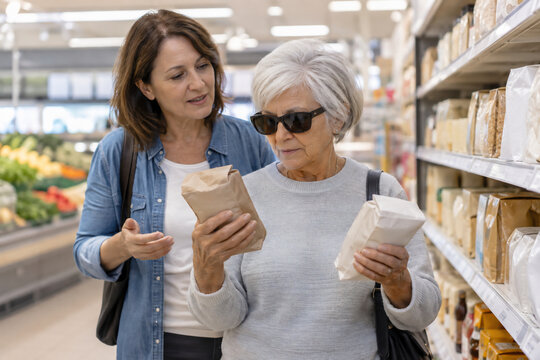 Visually Impaired Shopper Navigating Supermarket with Guided Assistant