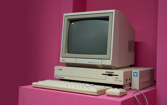 Commodore Amiga (1986). Commodore was an American computer company (1955&ndash;1994) founded in West Chester, Pennsylvania by businessman Jack Tramiel. Pink background.