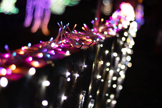 City holiday illuminations, a garland stretched along the wall with multi-colored light