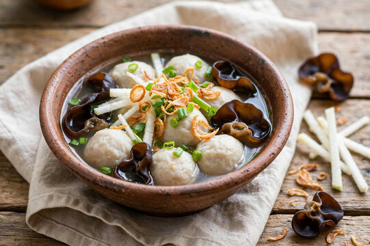 Traditional Palembang tekwan fish ball soup with mushroom and vegetables
