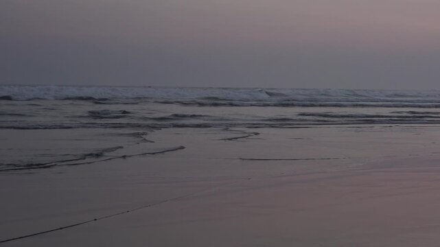 Dramatic Waves Crashing on Parang Tritis Beach at Dusk in Yogyakarta, Indonesia - Serene Coastal Landscape