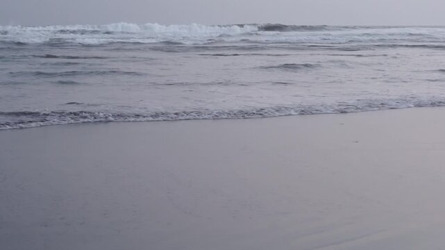 Dramatic Waves Crashing on Parangtritis Beach, Yogyakarta - Serene Coastal Landscape with Powerful Ocean Motion