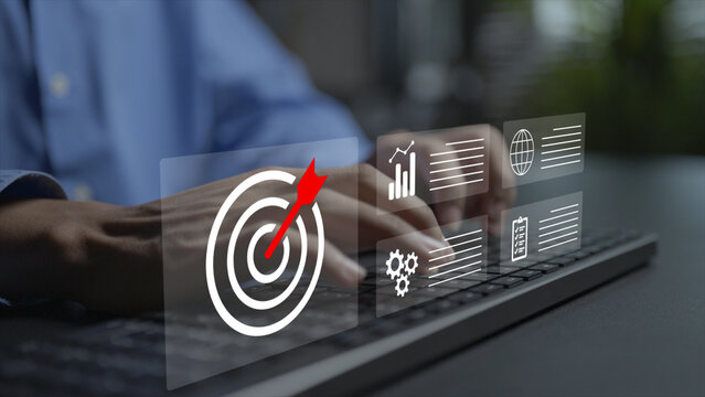 Business strategy, target and planning concept. Person typing on keyboard with target bullseye, growth roadmap and strategic gear icons, corporate goal setting and vision execution.