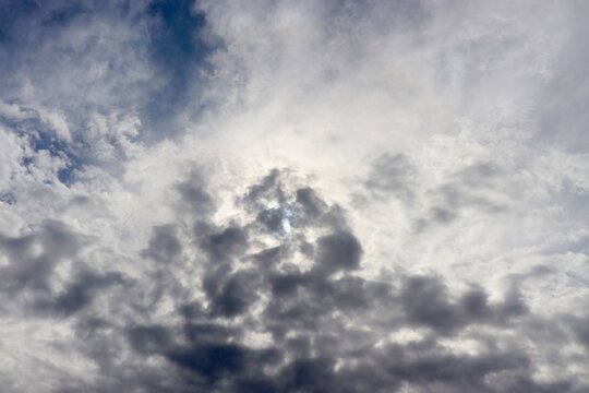 The white clouds in the sky.