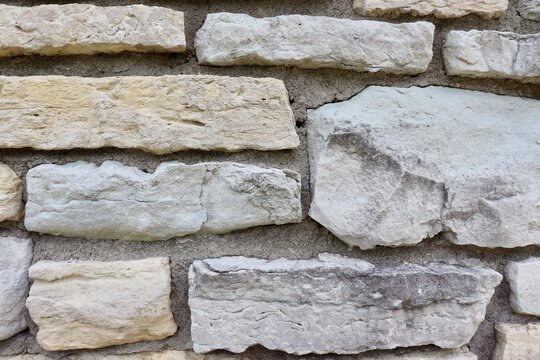 A close view of the stone wall surface.