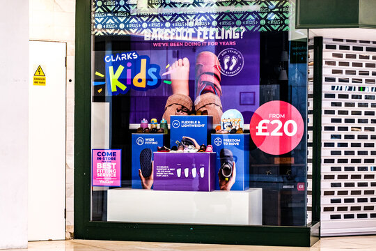 Clarkes Shoe Shop Window Dispaly Promoting Childrens and Kids Footwear On A British High Street