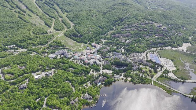 Aerial view of Mont Tremblant resort village, Quebec, Canada with lake, forest and mountain landscape in summer. g.
