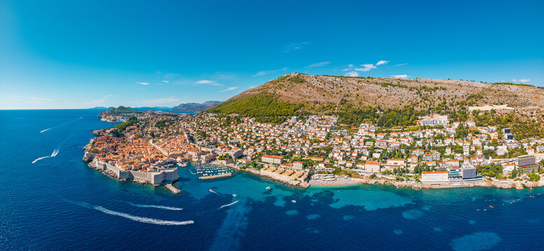 Panoramic aerial view of Dubrovnik Croatia featuring historic Old Town city walls blue Adriatic Sea and coastal hills