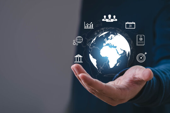 Global business strategy, featuring a digital globe held by a professional, surrounded by management icons for planning, finance, teamwork, analytics, scheduling, compliance, and international growth.
