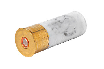 Empty shotgun shell on a plain background showing details of the casing and primer © fotofabrika