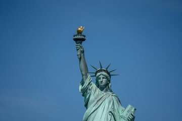 Statue of Liberty with blue sky background, New York City, USA © JeanChristophe