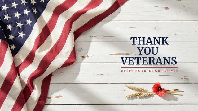 United States flag with Thank You Veterans text on a rustic white wood background