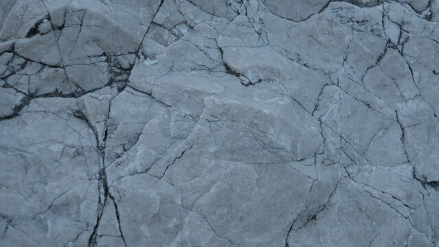 Abstract Natural White and Grey Rock Texture with Cracked Pattern and Copy Space
