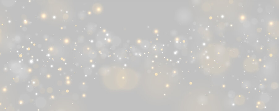 Scattered glowing bokeh light spots float on a dark background. The lights have a soft, diffuse glow in warm amber and cool white hues. This image is ideal for festive or atmospheric design.