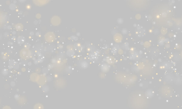 Various small glowing particles float against a black background. The lights appear in warm amber and cool silver tones with soft bokeh effects. This composition provides an elegant sparkly.