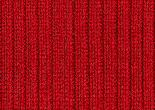 Red knitted wool texture background with vertical ribbed pattern close up
