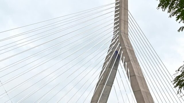 The famous architecture of the iconic Zakim Bridge in Boston, Massachusetts, USA on a cloudy day.