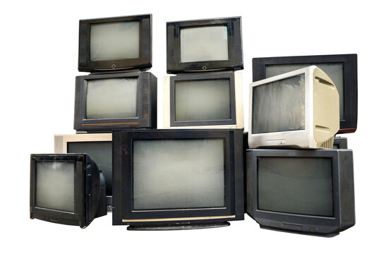 Retro old televisions pile on floor in front with clipping path isolated on white background. Antique and vintage style, TVs blank screen display, clipping path.
