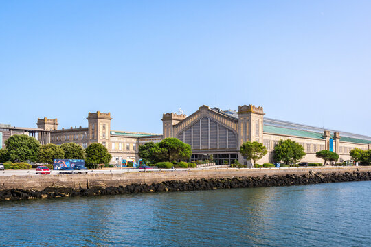 Cherbourg, France - July 21, 2026: General view of the former Transatlantic Maritime station, with the transatlantic hall (left) and the railway hall (right), home to the Cite de la Mer museum.