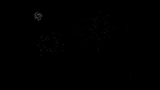 Fireworks explosion animation on black background. White sparkle burst celebration effect with light particles. New Year and festive fireworks display motion graphic for overlay